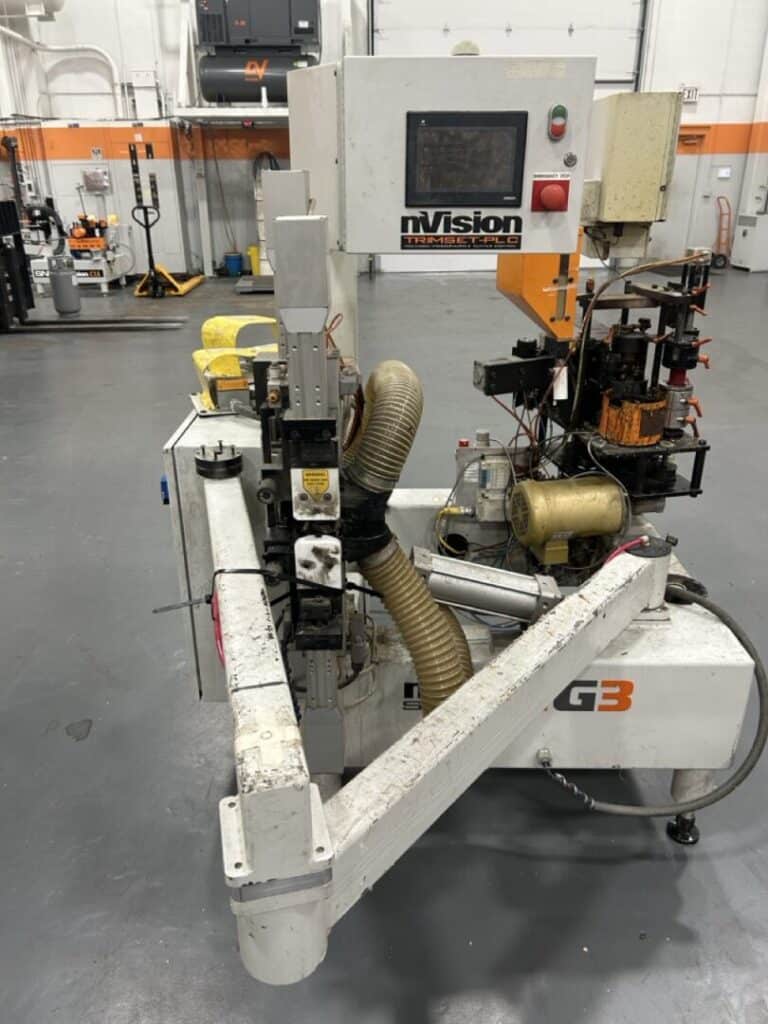 High-speed industrial cutting machine with automation features for precision manufacturing.